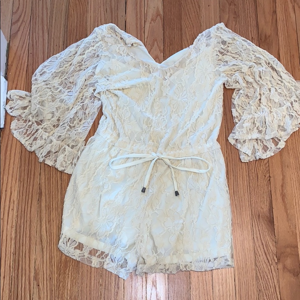 Ryu branded cream romper